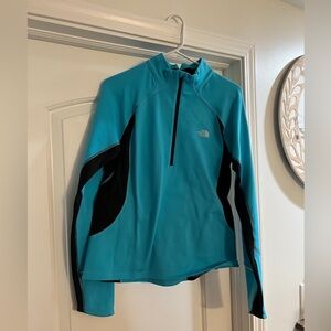 The north face blue running jacket
